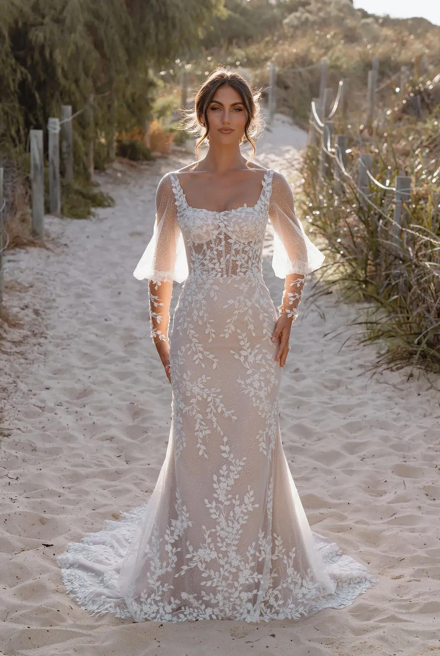 Straps, Necklines, and Silhouettes: Crafting Your Ideal Wedding Dress Ensemble Image